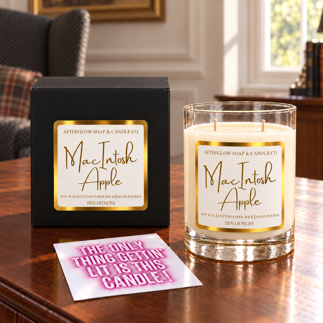 MacIntosh Apple candle with matching closed box and quote card.