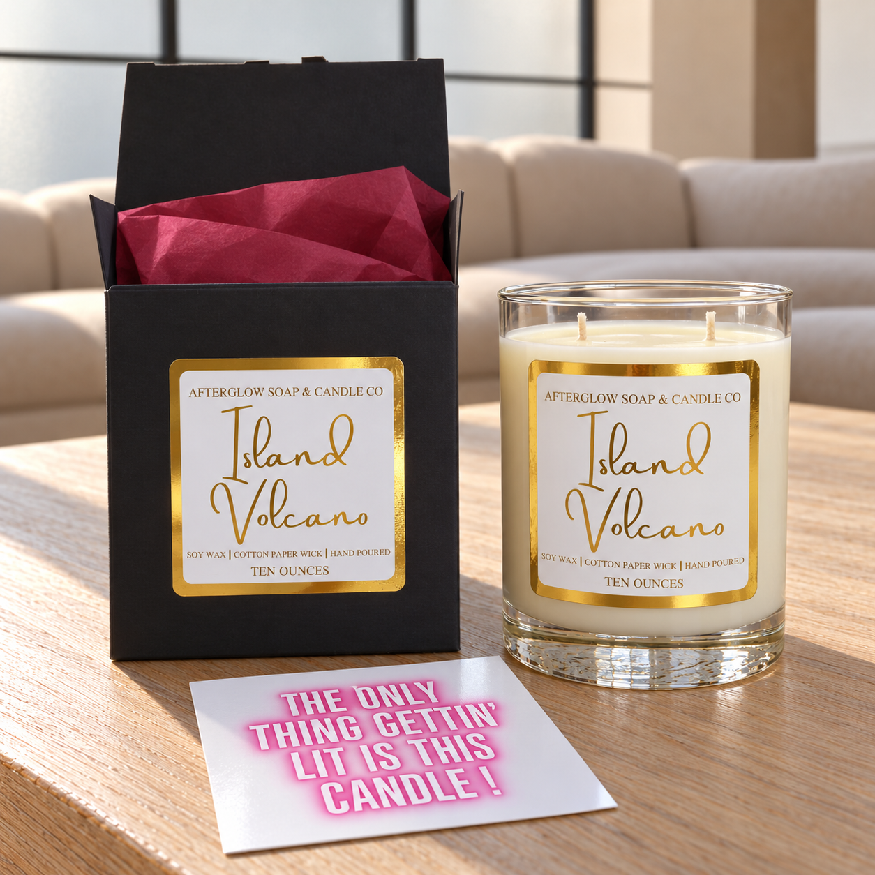 Island Volcano candle with matching open gift box, cranberry tissue and quote card.