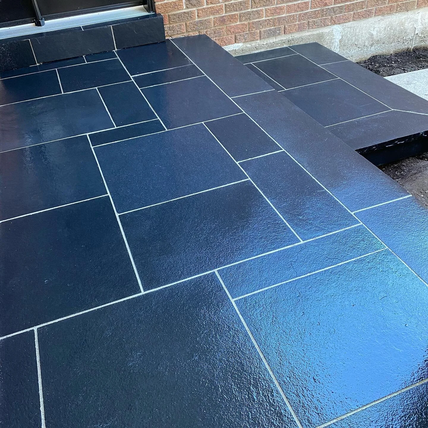 Sneak Peek.... Still needs to be Cleaned, Caulked, Sealed and Softscaped. Nevertheless some eye candy.