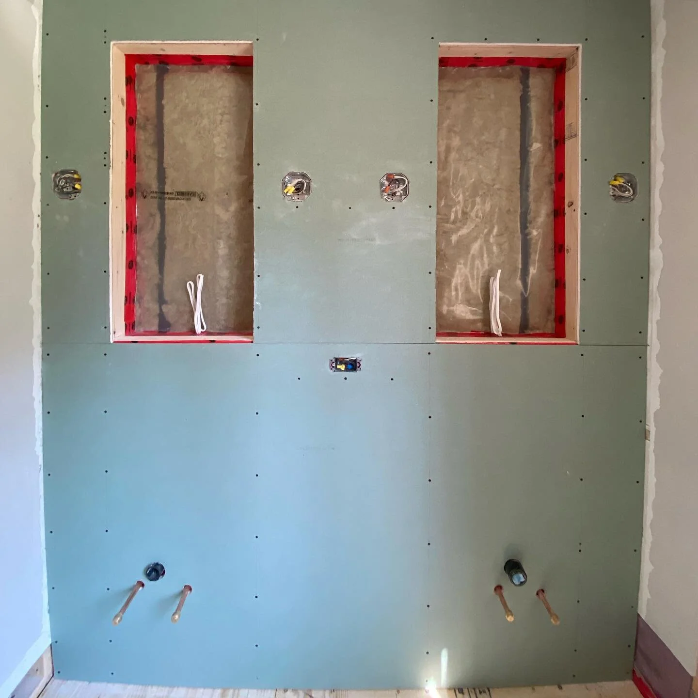 The last picture is a prime example of what a framed out vanity wall is NOT supposed to look like. Whenever we do any work we document the whole process, from start to finish with pictures and videos and leave the clients with a chronological copy. T