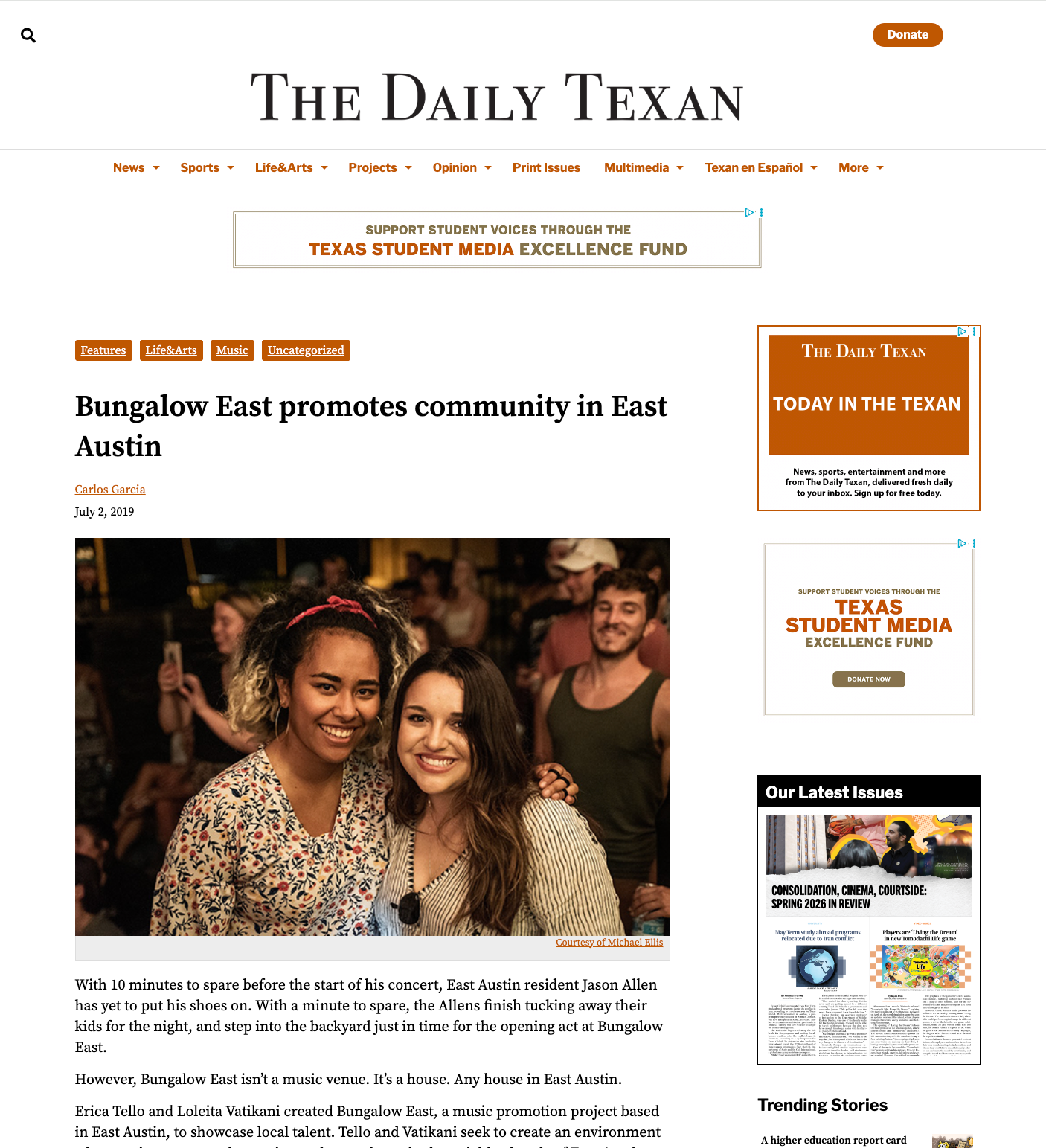 A screenshot of the homepage of 'The Daily Texan' website, featuring news articles, navigation menus, and advertisements. The main article shows two young women smiling in a crowded indoor event.