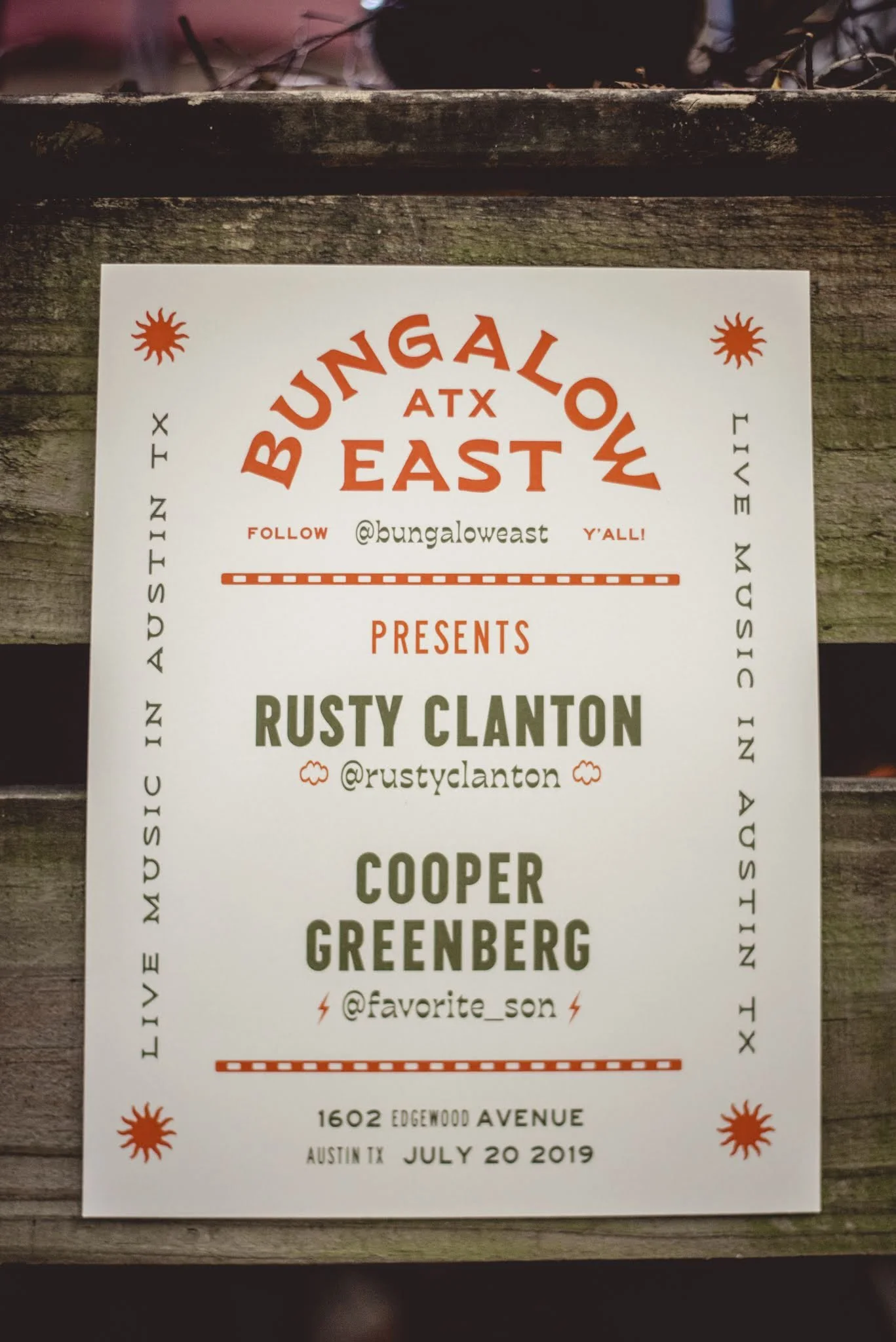Event flyer for Bungalow East in Austin, Texas, featuring music acts Rusty Clanton and Cooper Greenberg, scheduled for July 20, 2019, at 1602 Edgewood Avenue, with decorative sun icons and bold event details.