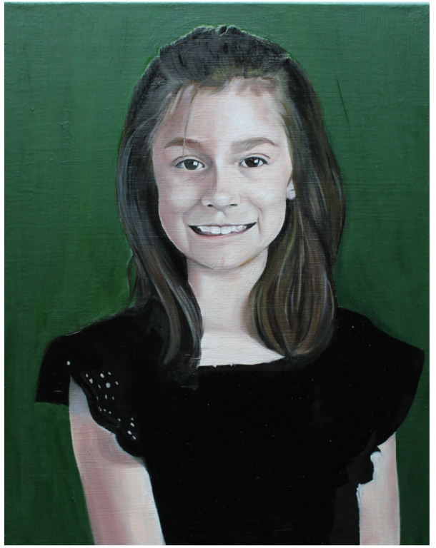 Portrait of a young girl with shoulder-length brown hair, wearing a black top, smiling, against a green background.