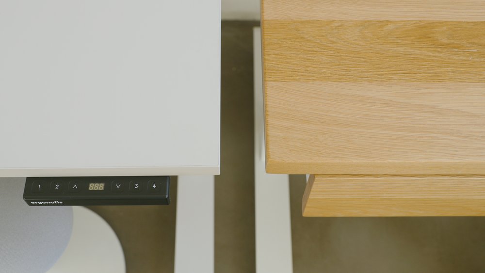  The Shift desk in pale grey (left) and Sway desk in white oak (right). 