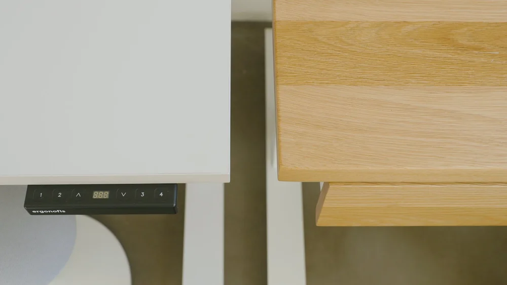  The Shift desk in pale grey (left) and Sway desk in white oak (right). 