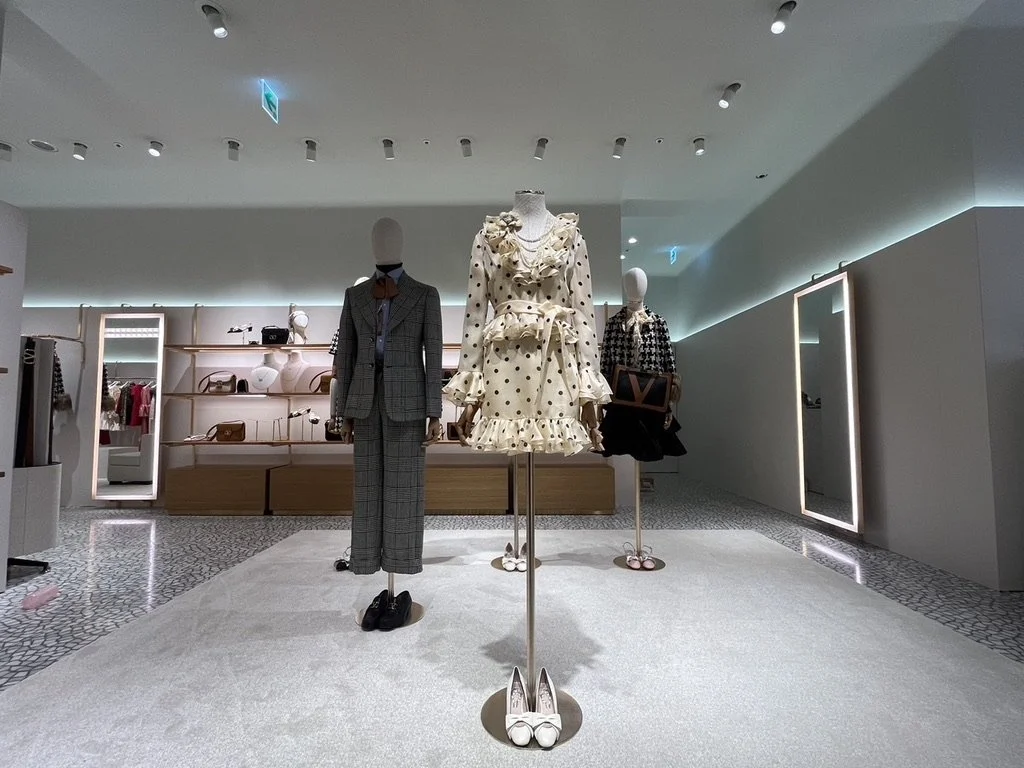 Final boutique installation with ivory drapery