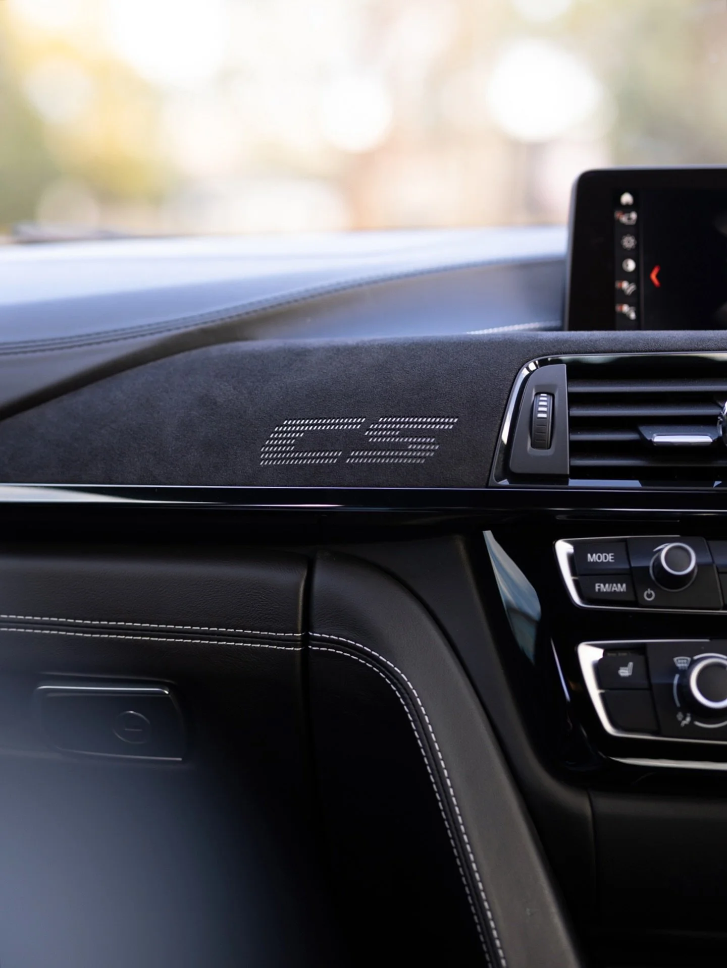 Final set from the Lime Rock Grey M3 CS &ndash; focusing on the close-ups and finer details that matter. Emblems, stitching, badges. The little things that show condition and character.
#BMWM3CS #LimeRockGrey #BMWM3 #CarPhotography #BMWForSale #CSDet