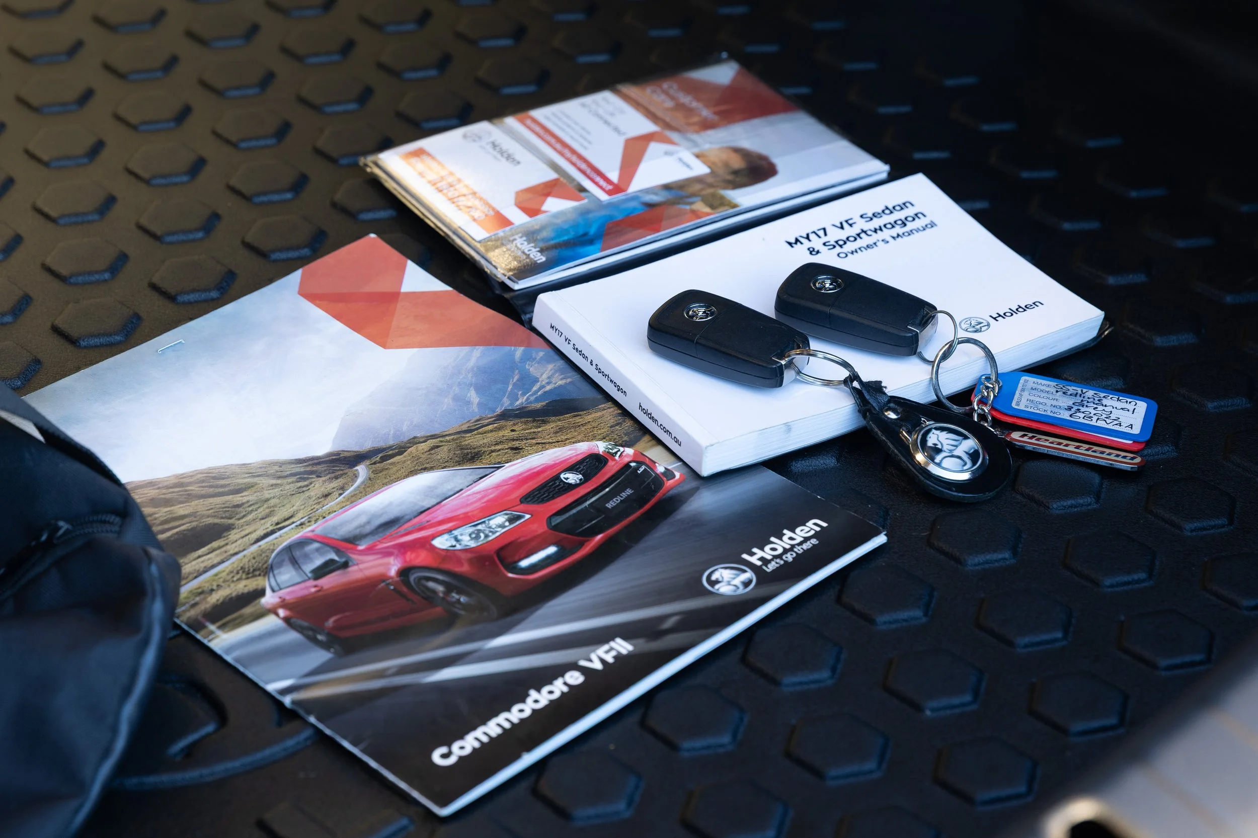 Holden Commodore logbooks, keys, brochures and original accessories