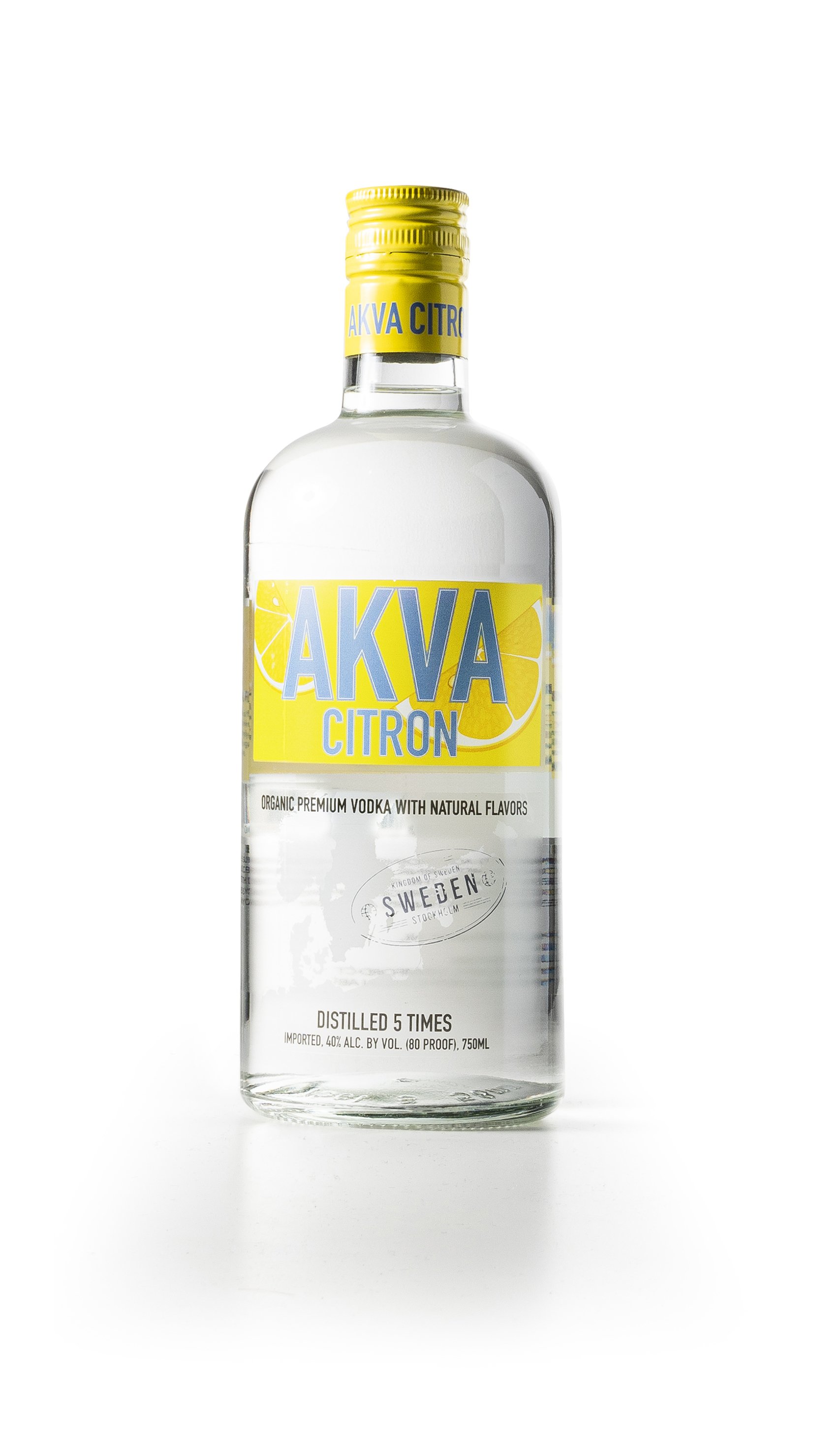 Bottle of AKVA Citron flavored vodka with a yellow and blue label, clear liquid inside, and a yellow screw cap, against a white background.