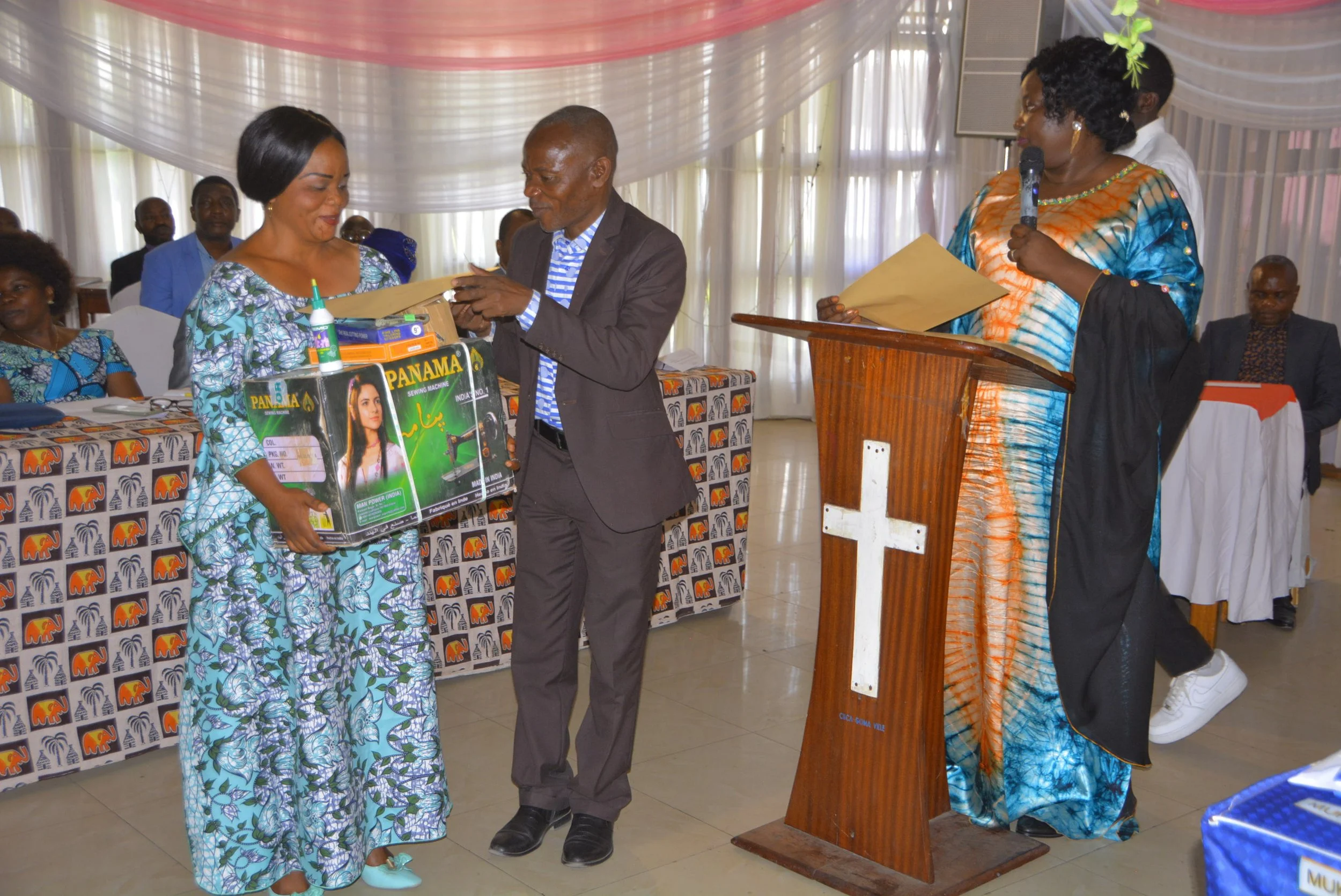 Rev.  Kyongonga giving kit..JPG