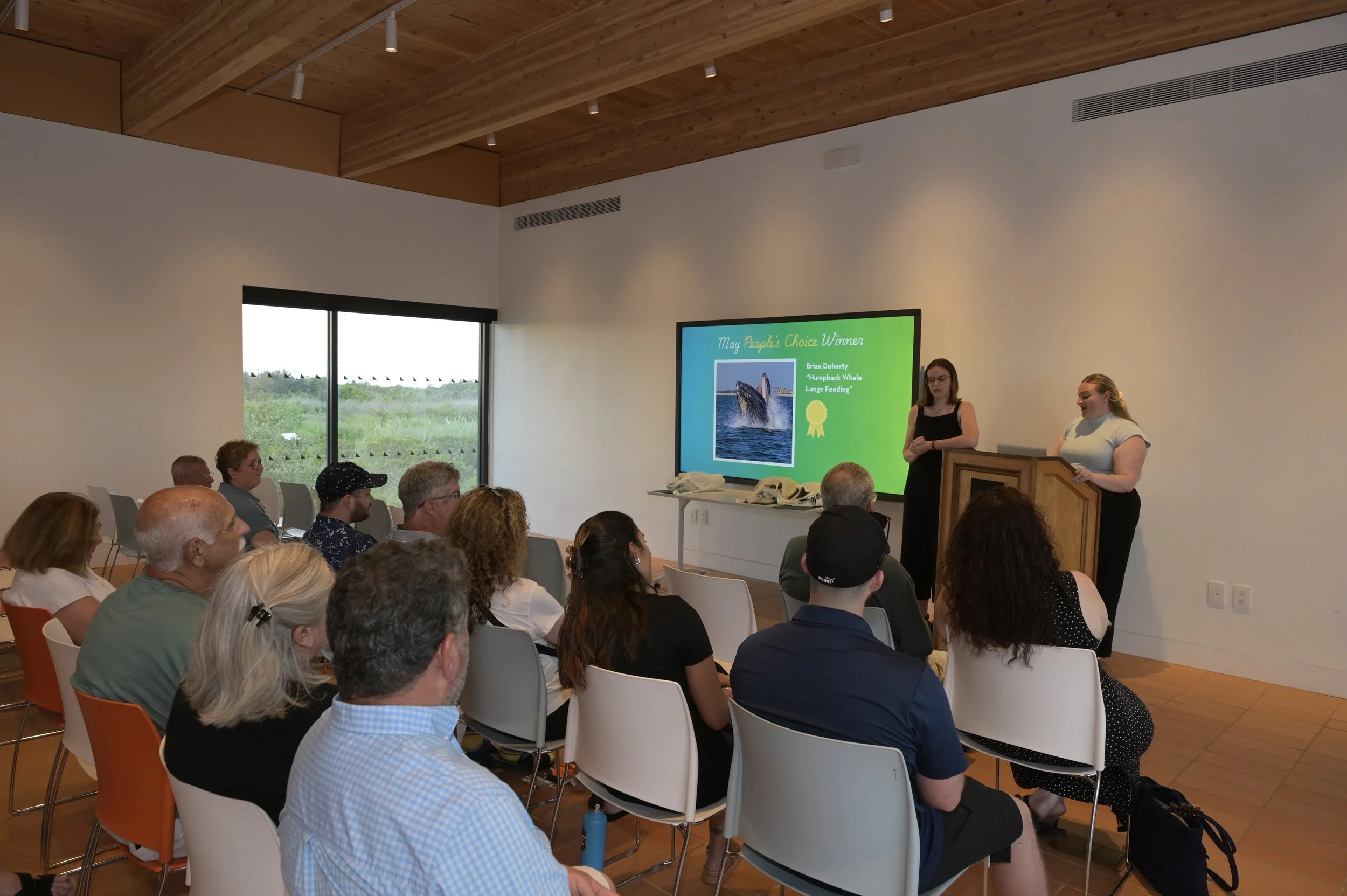 The 2025 winning photographer award ceremony.  