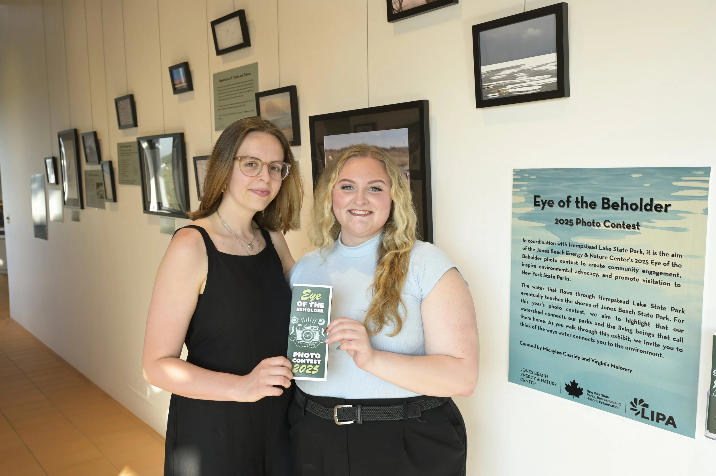 Co-curators at the 2025 Eye of the Beholder Exhibit opening. 