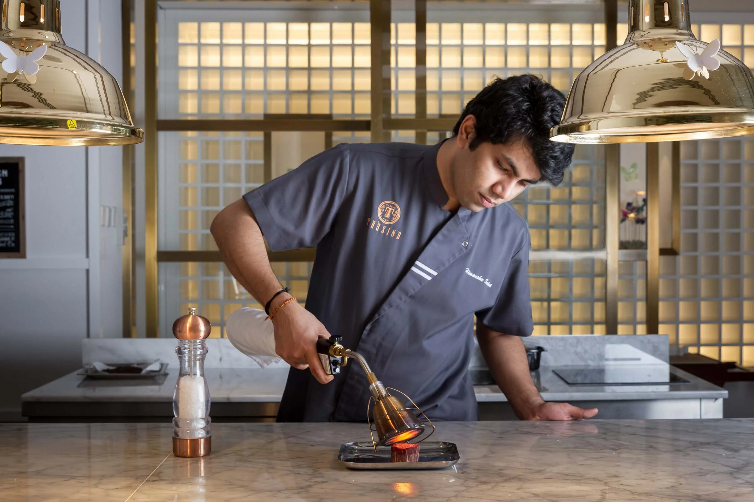   HIMANSHU SAINI  
  HEAD CHEF | TRÈSIND STUDIO  
  He single-handedly put modern Indian cuisine on the world map. His creations are a trip down the rabbit hole to an Indian Mad Hatter’s Tea Party. He was voted 2021 Chef of the Year and put his Trèsi
