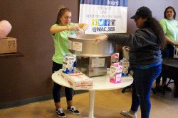 SEB students make cotton candy at the cookout on admitted students day