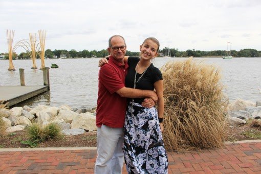 Olivia Libowitz ’18 and her father pose at the waterfront.