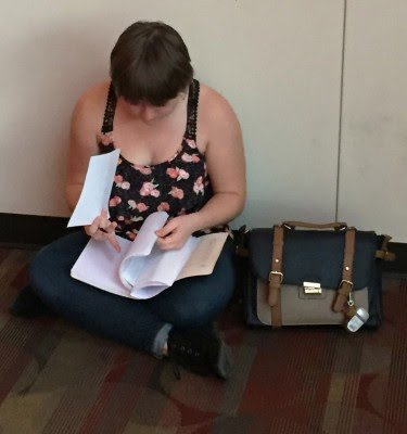 Casey Williams "ruins" an anti-women's suffrage pamphlet.