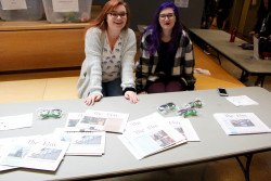 Abby Wargo and Brooke Schultz advertise WAC’s student newspaper “The Elm” during the student activities fair