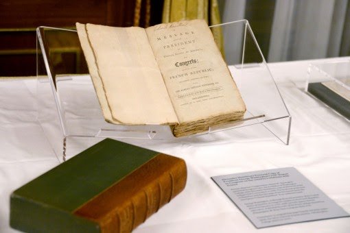 Historical artifacts related to Alexander Hamilton on display before the event.