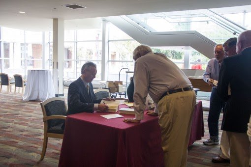 Nick Bunker hosts a book signing for his book An Empire on the Edge, before the lecture.