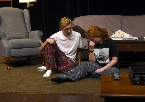 Stephen and Emily share an intimate moment.