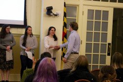 Alex Sabo accepts his certificate