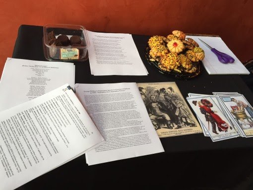 A table with the various provided writing pieces to ruin, as well as some snacks. Students were also invited to bring their own texts to ruin.