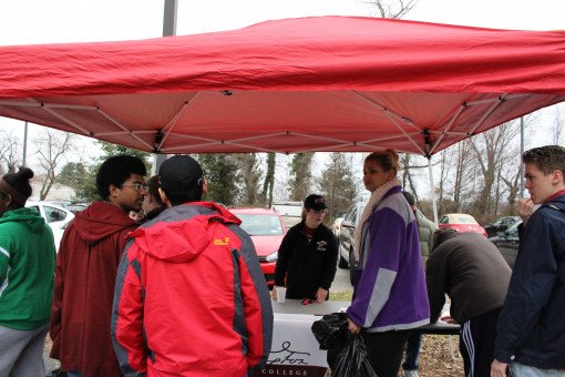 Students sign in at the SGA table in front of the Armory.