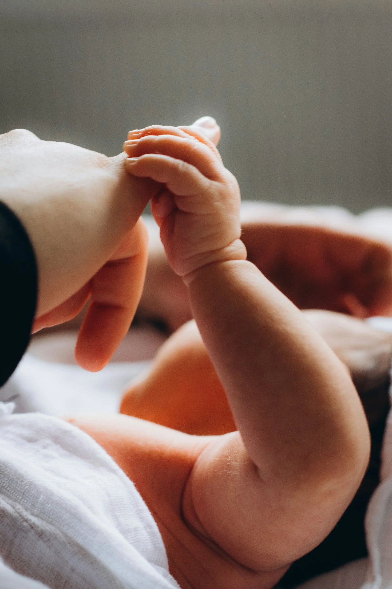 femme en post-partum avec son bébé