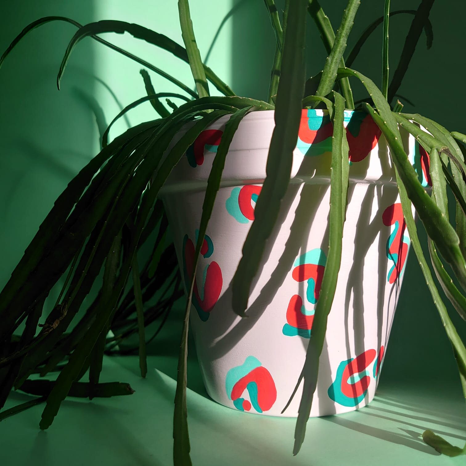 large pink leopard print plant pot