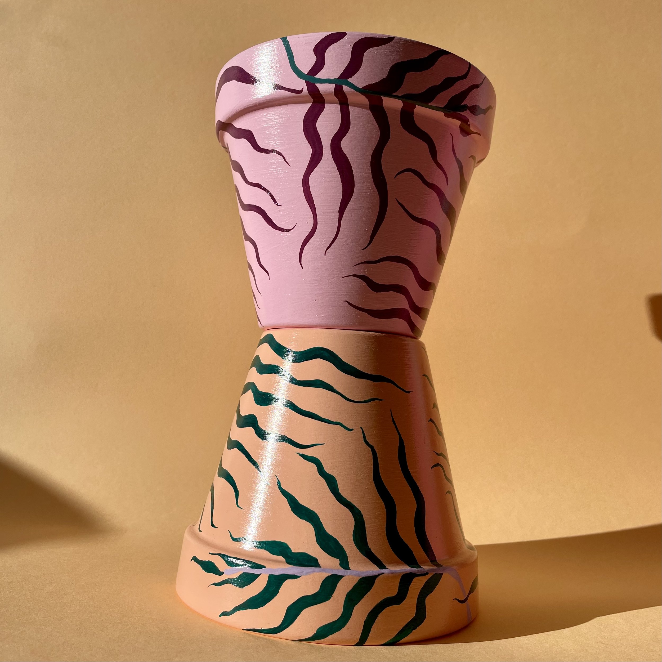 pink and terracotta plant pots