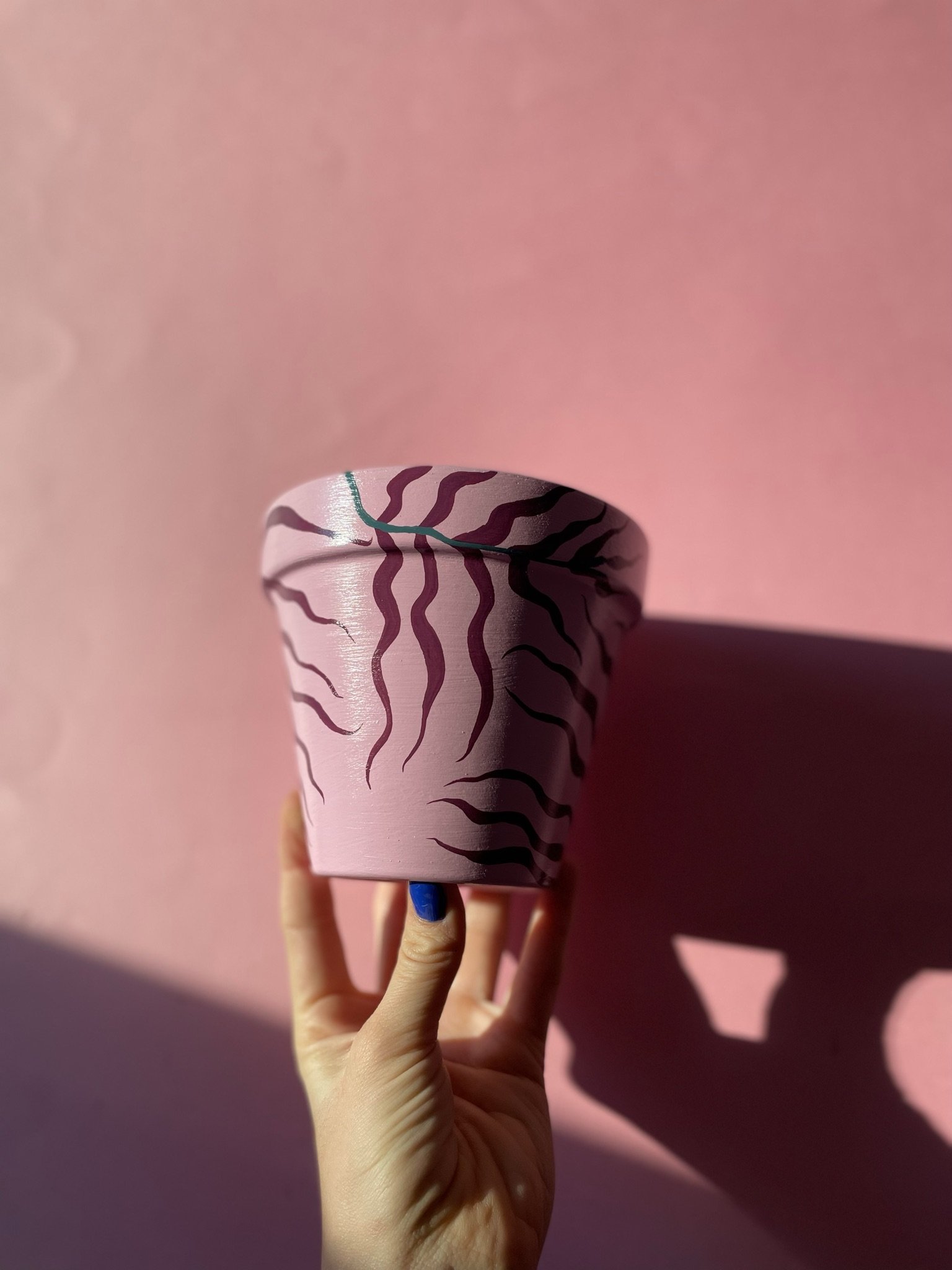 pink and burgundy print plant pot