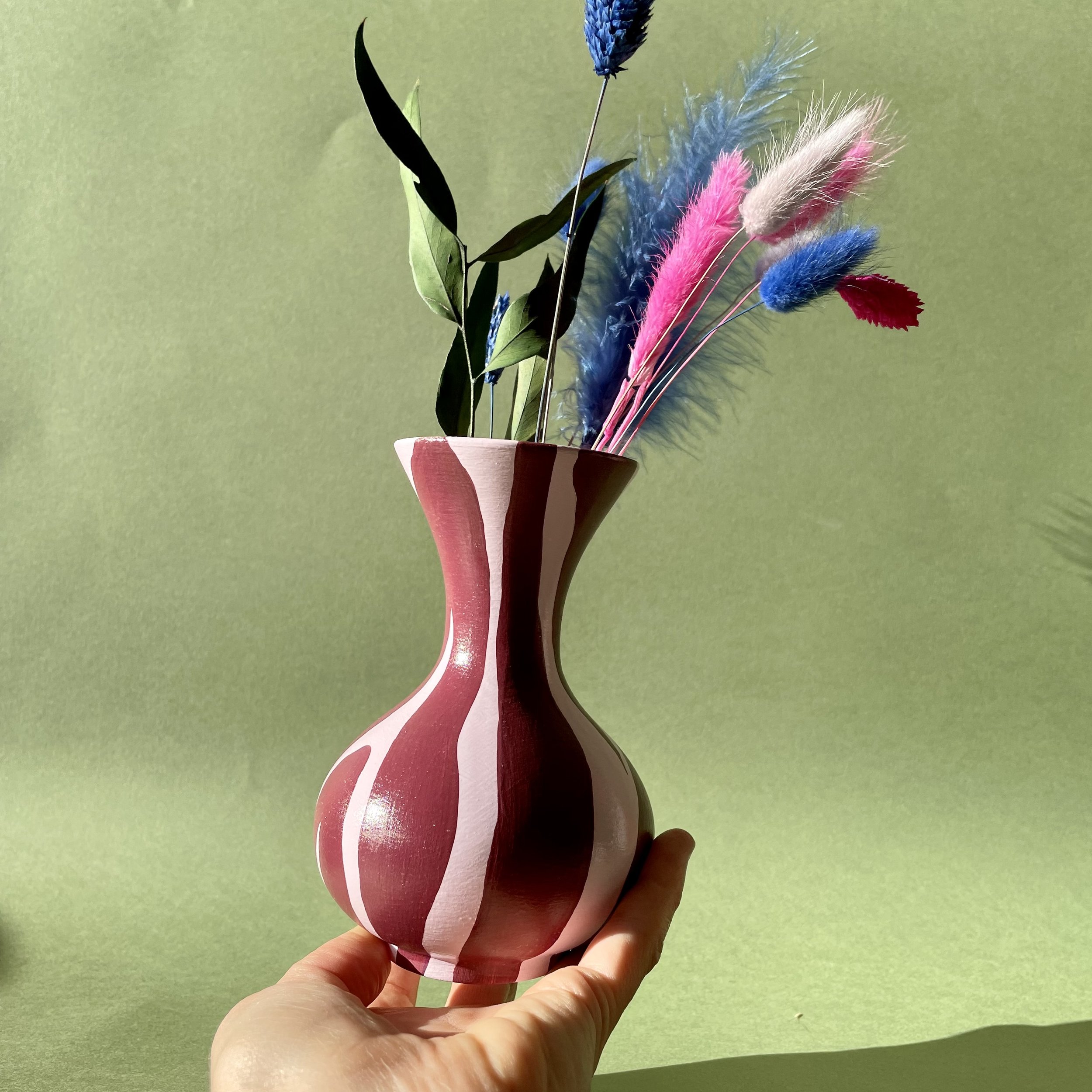 ceramic vases with dried flowers