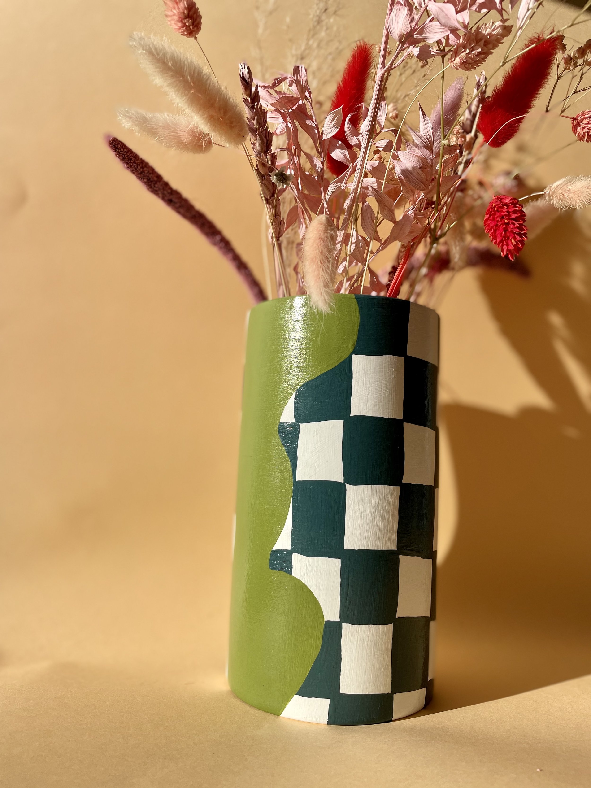 green and white checkerboard vase