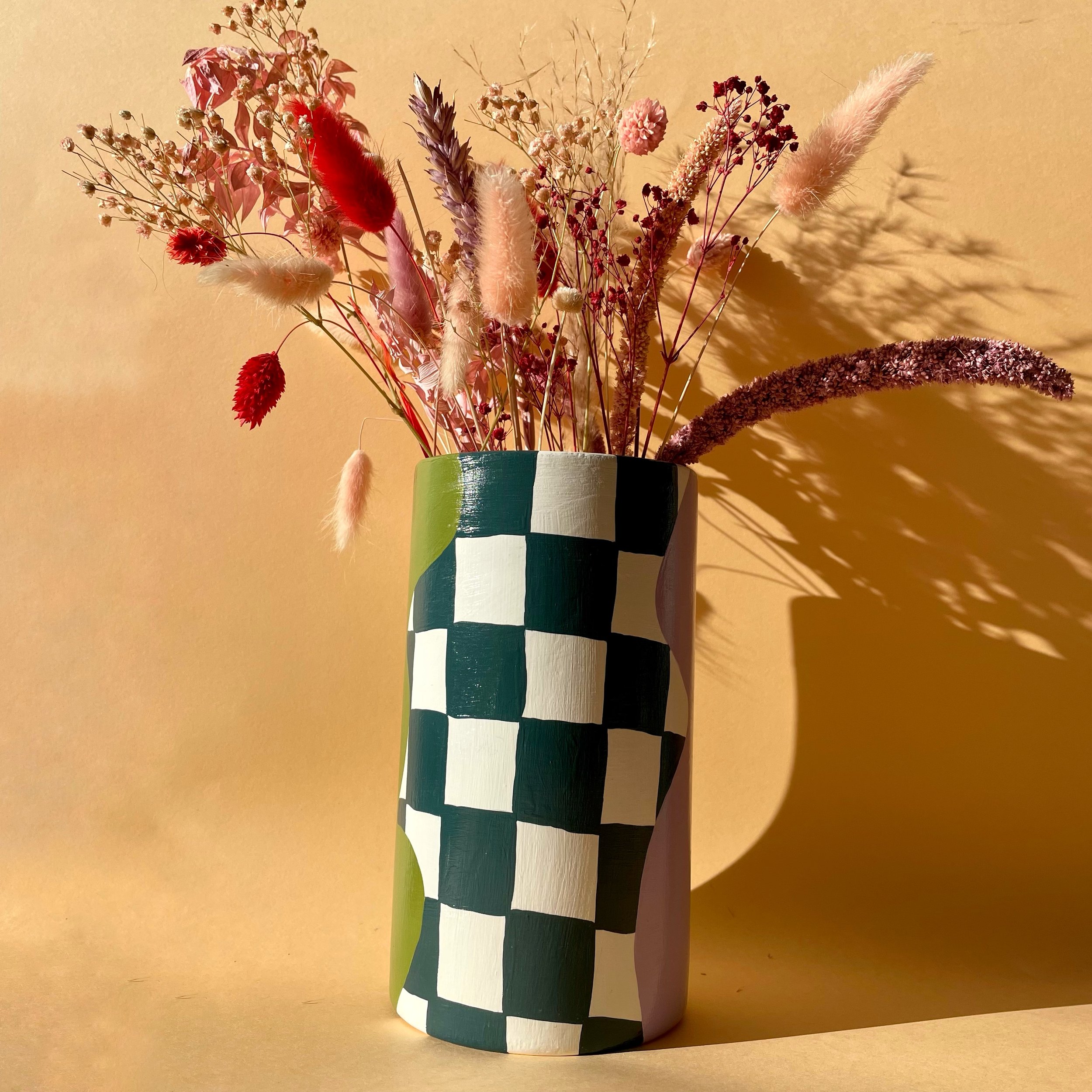 colourful checkerboard cylinder vase