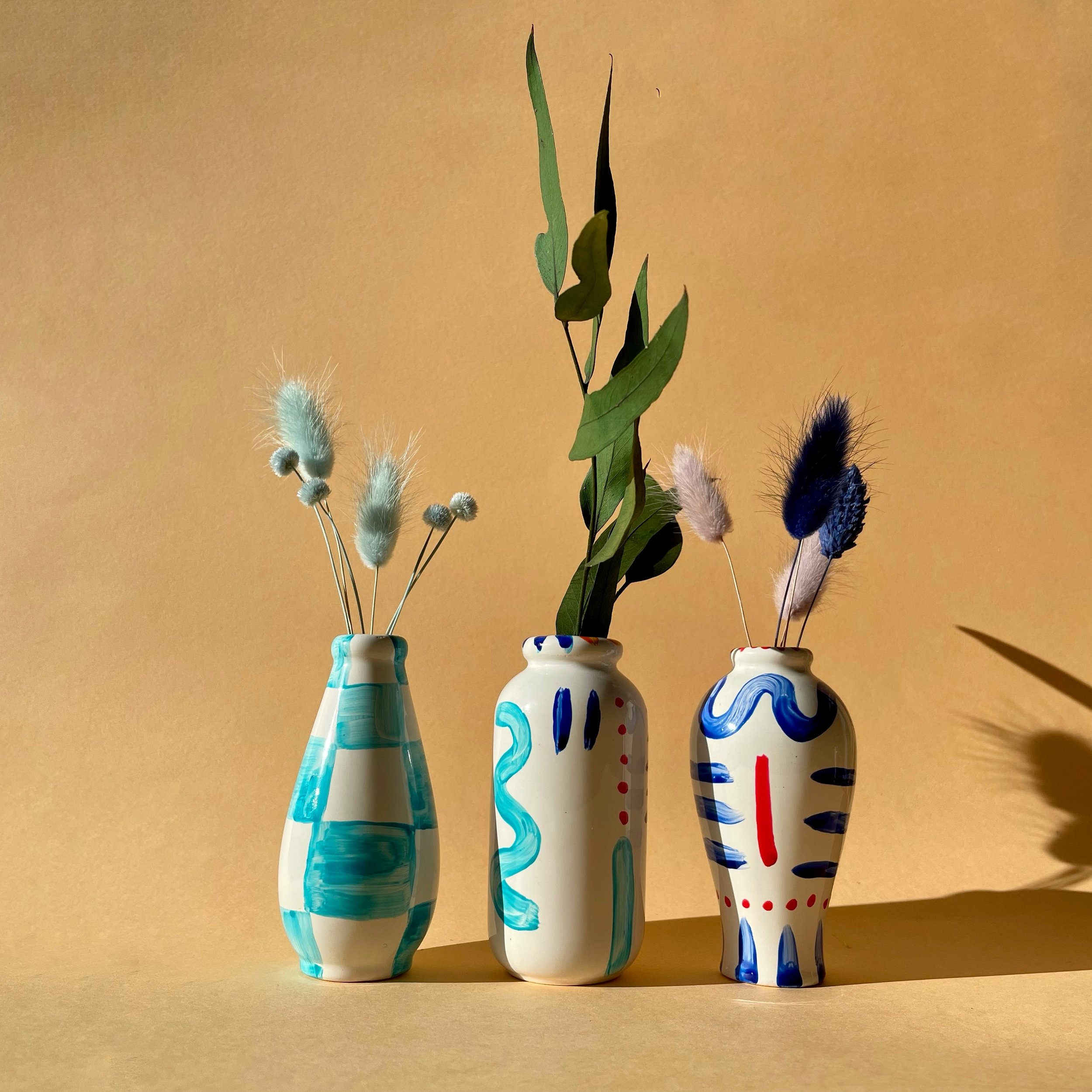 blue ceramic stem vases