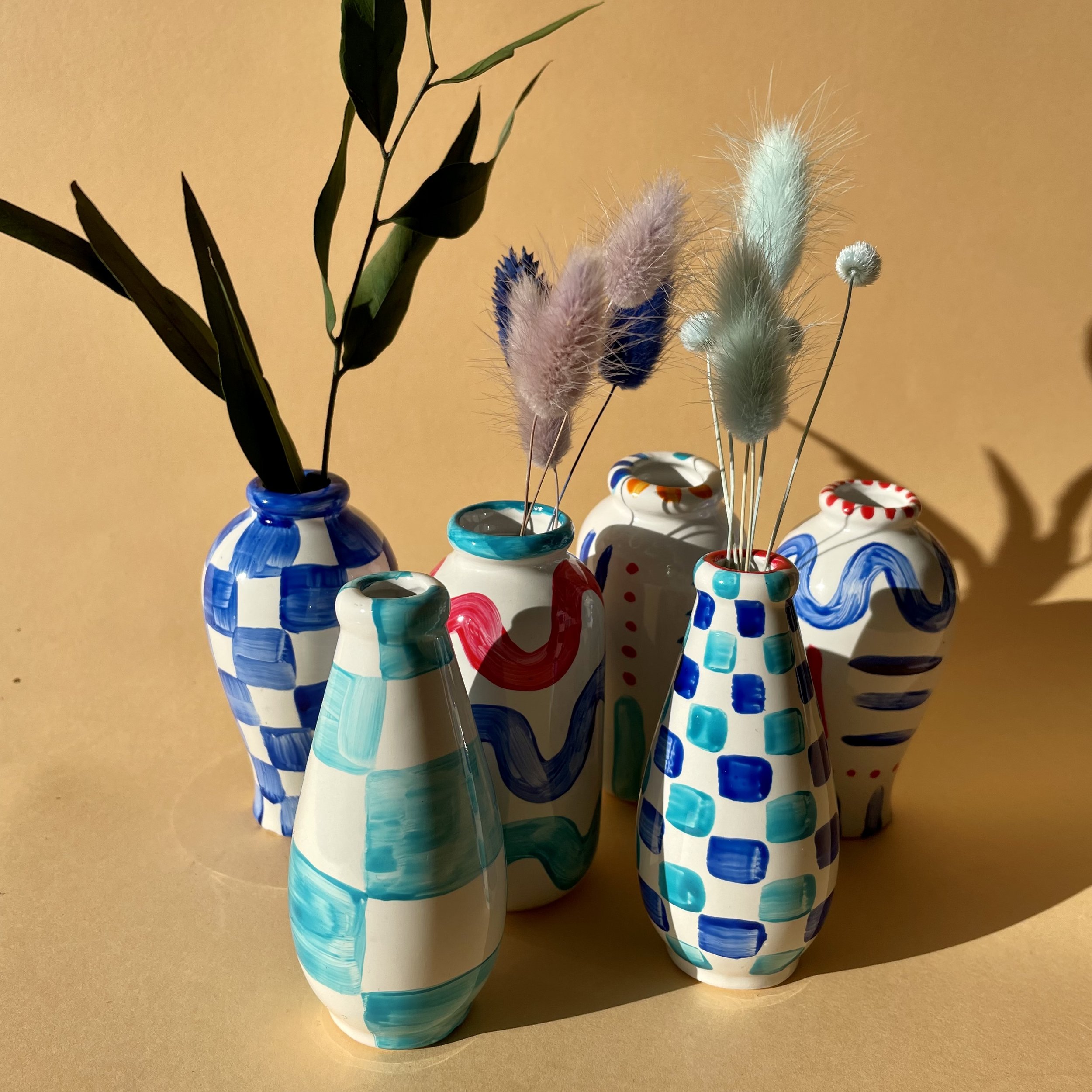 group of stem vases in bright colours (Copy)