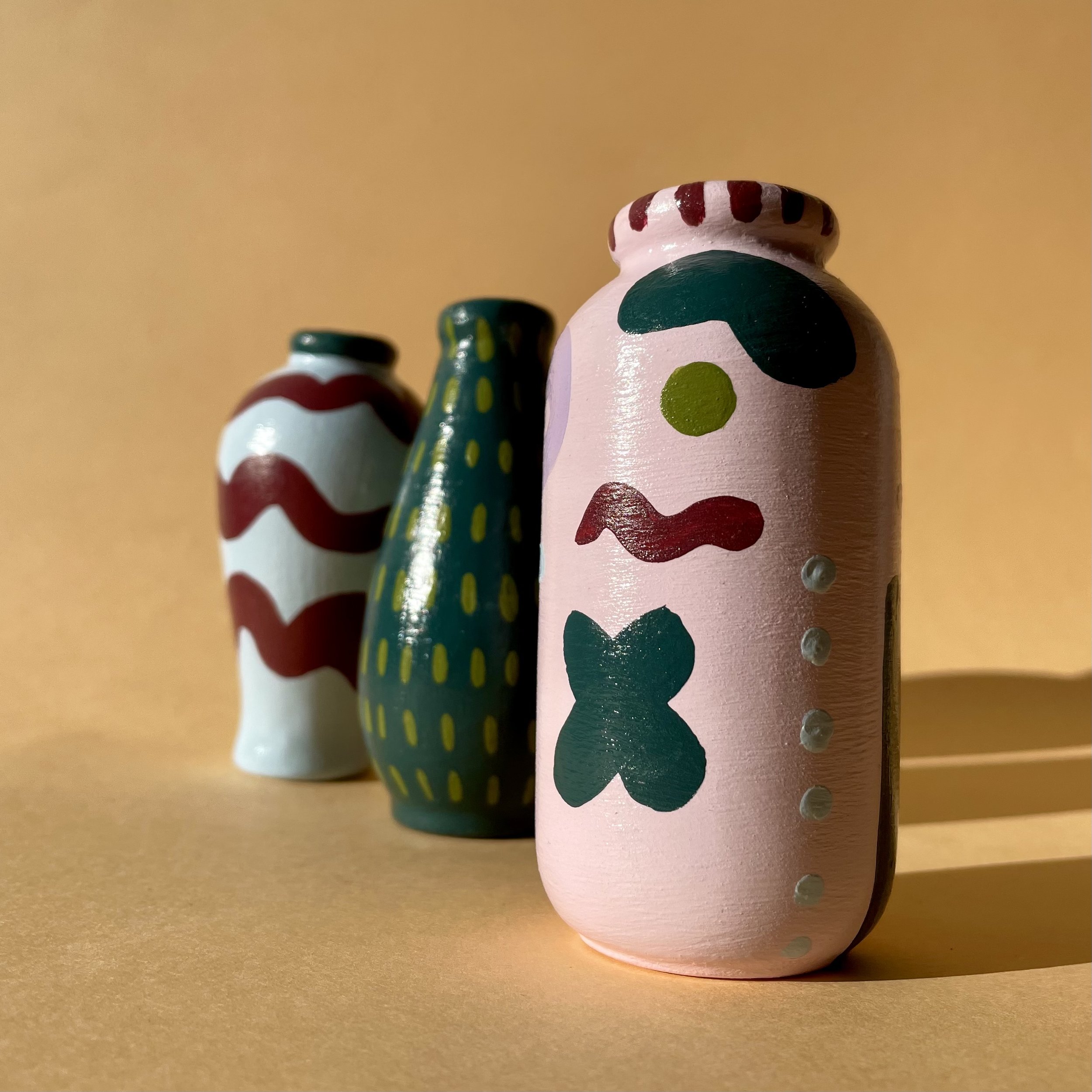 pink abstract stem vases
