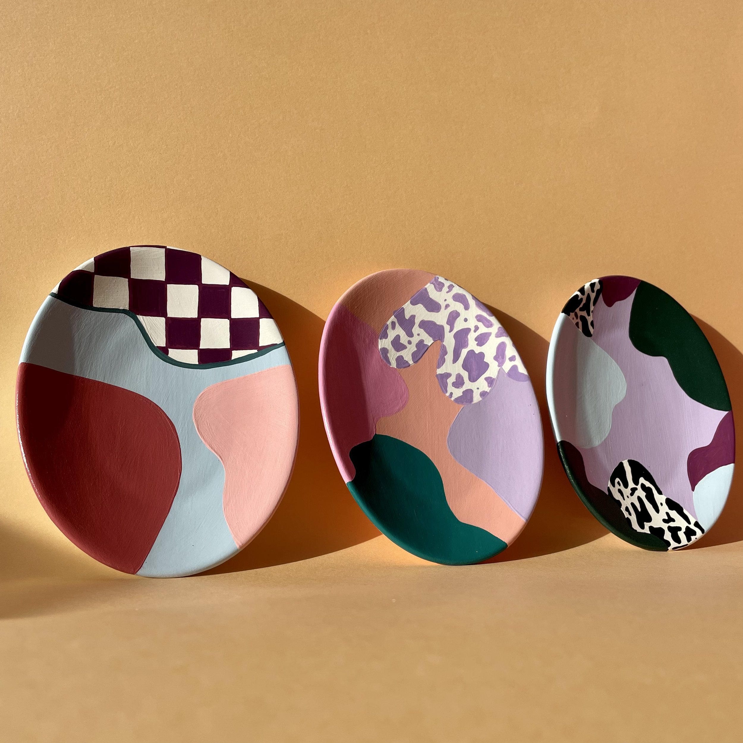 sun shining on colourful trinket dishes
