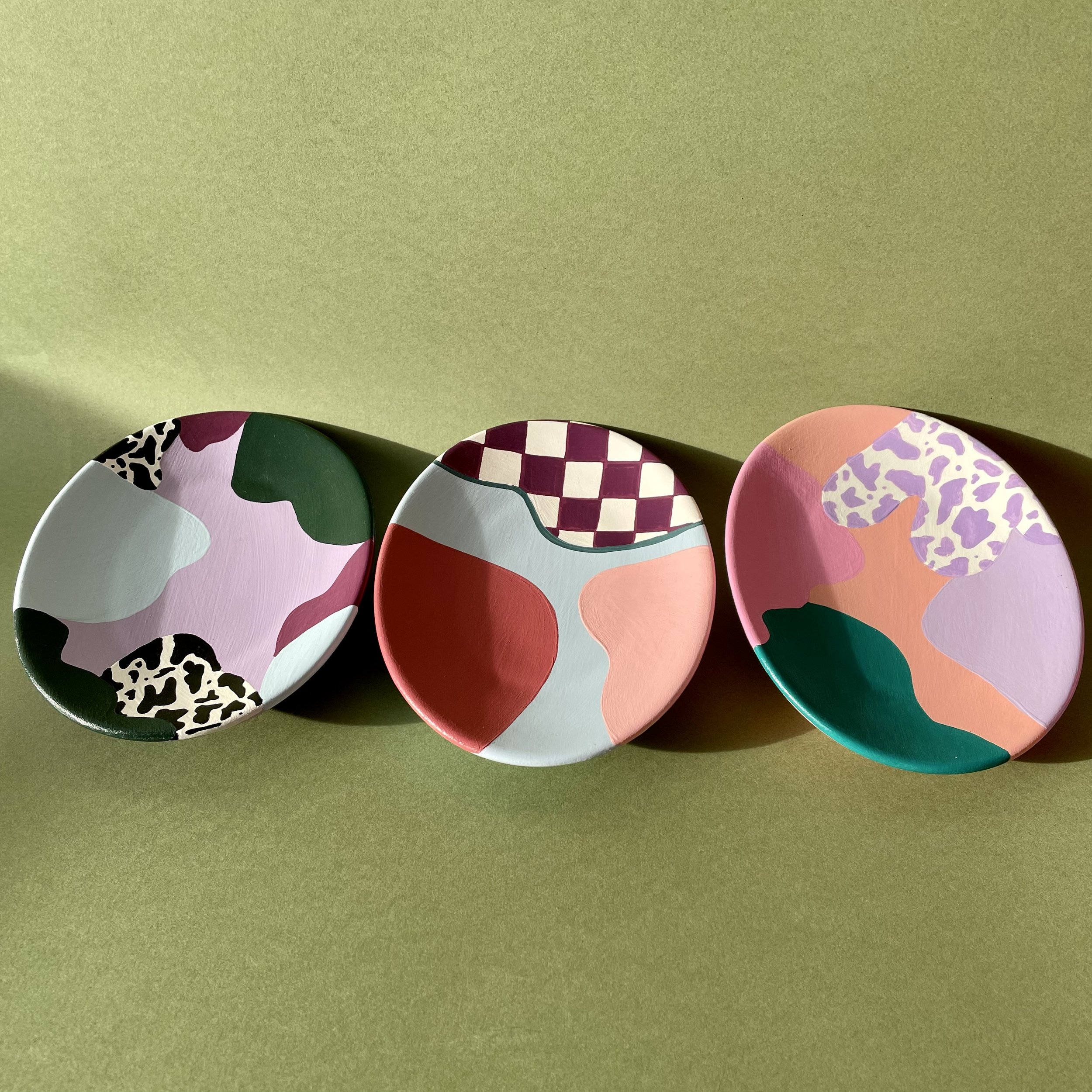 colourful trinket dishes lined up