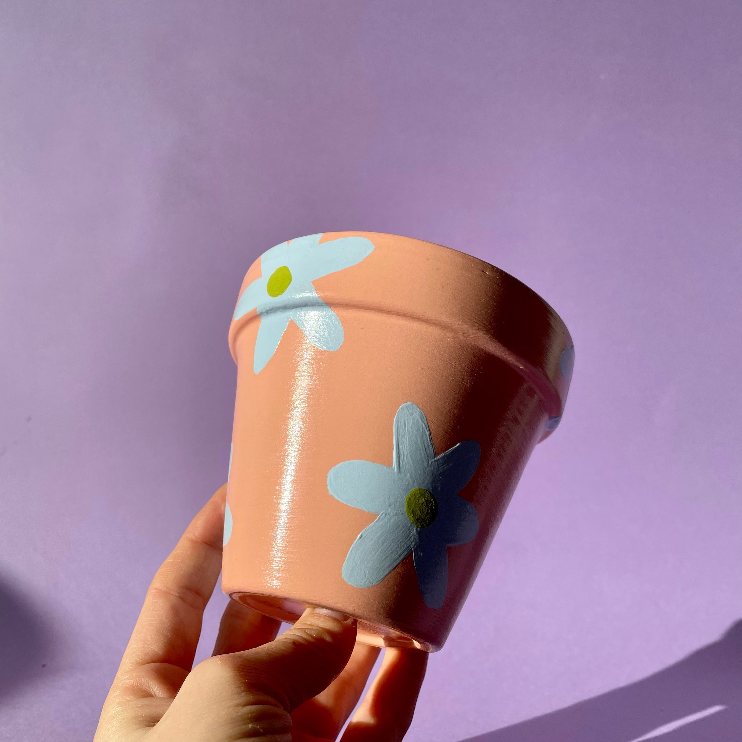 peach and blue flowerpot