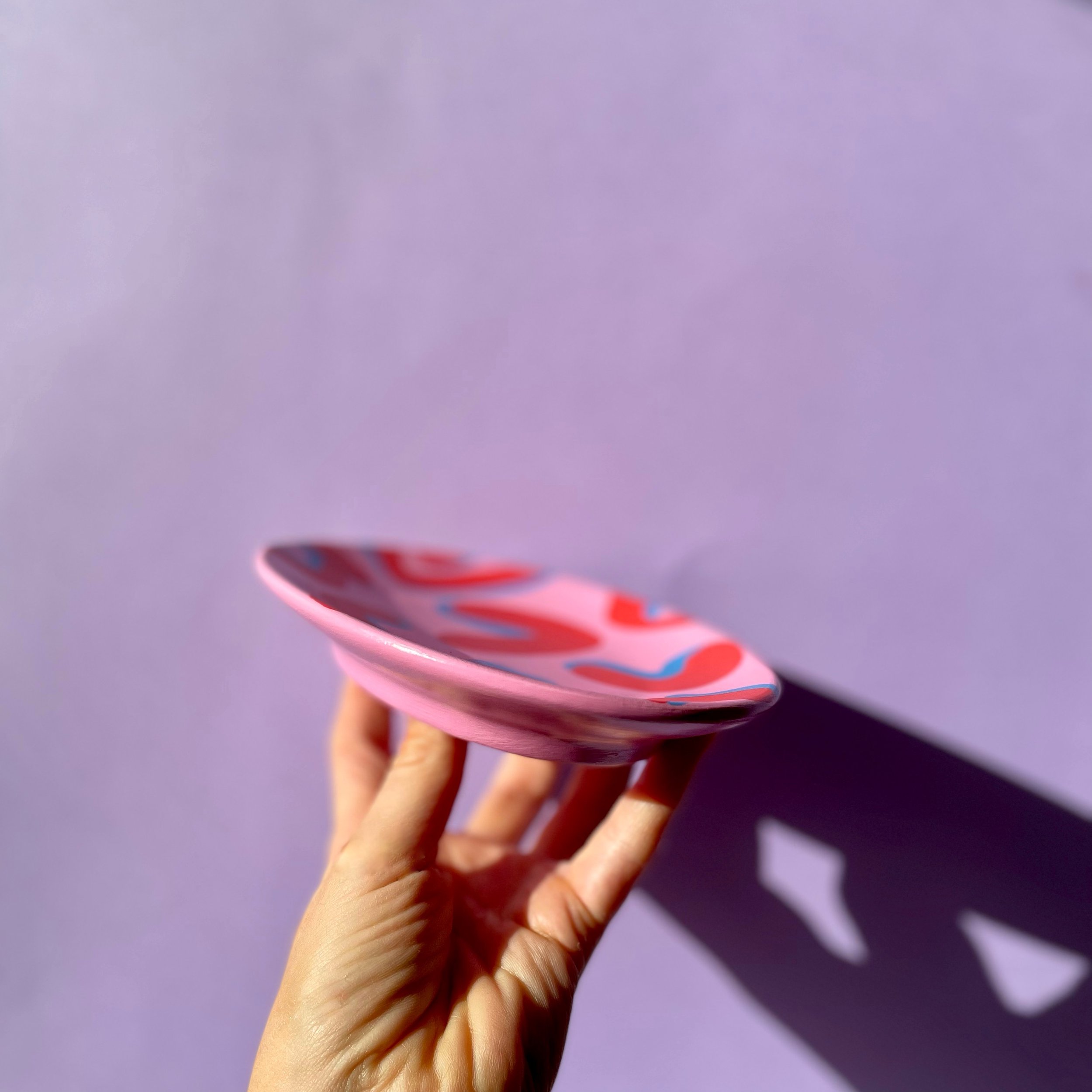 side view of a leopard print trinket dish