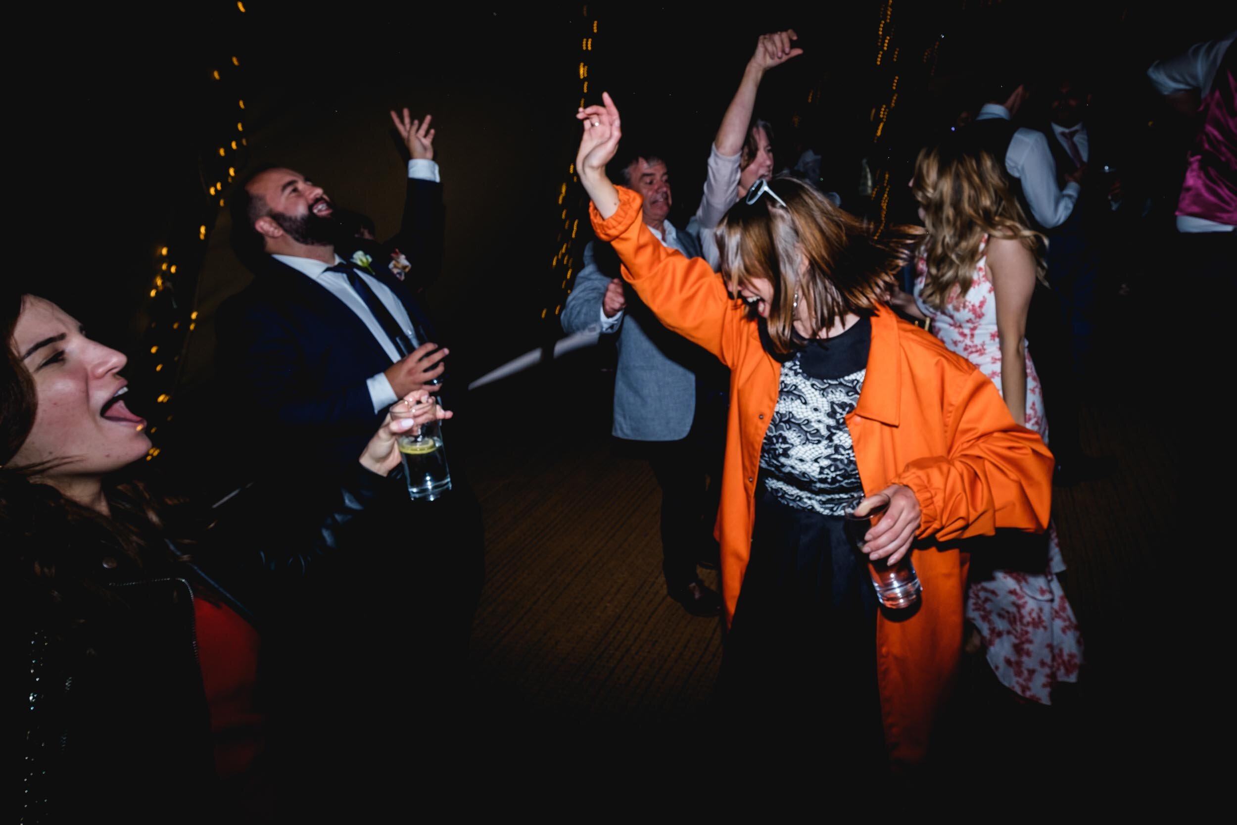wedding guests partying at butley priory