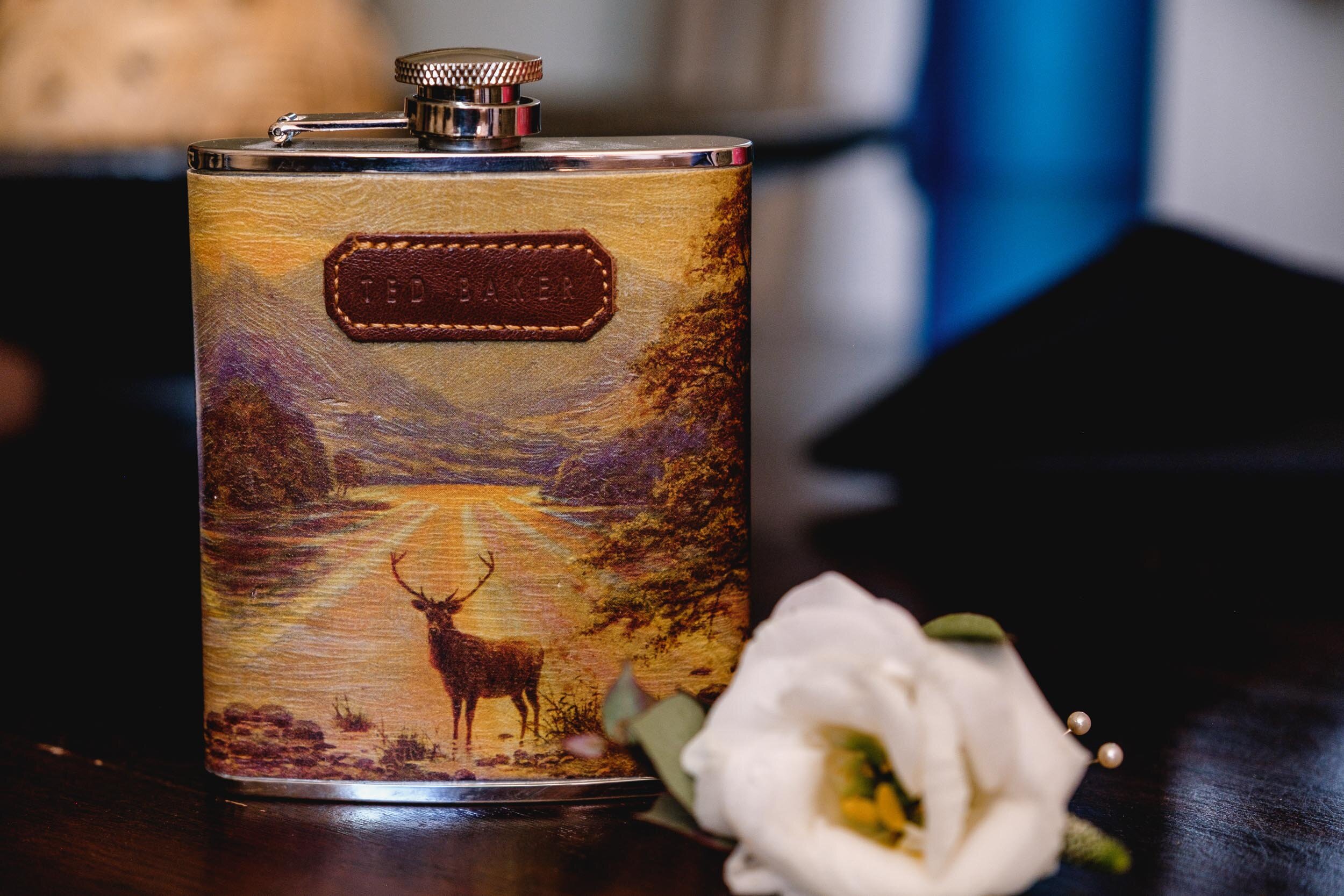 ted baker hip flask and rose buttonhole