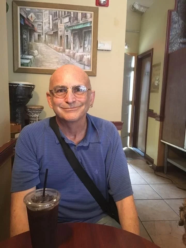 Coffee in Espress Yourself with 5FU bag over shoulder.