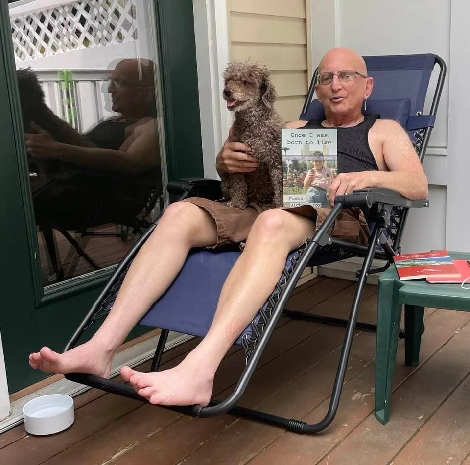 A boy, his dog, and his new poetry collection.