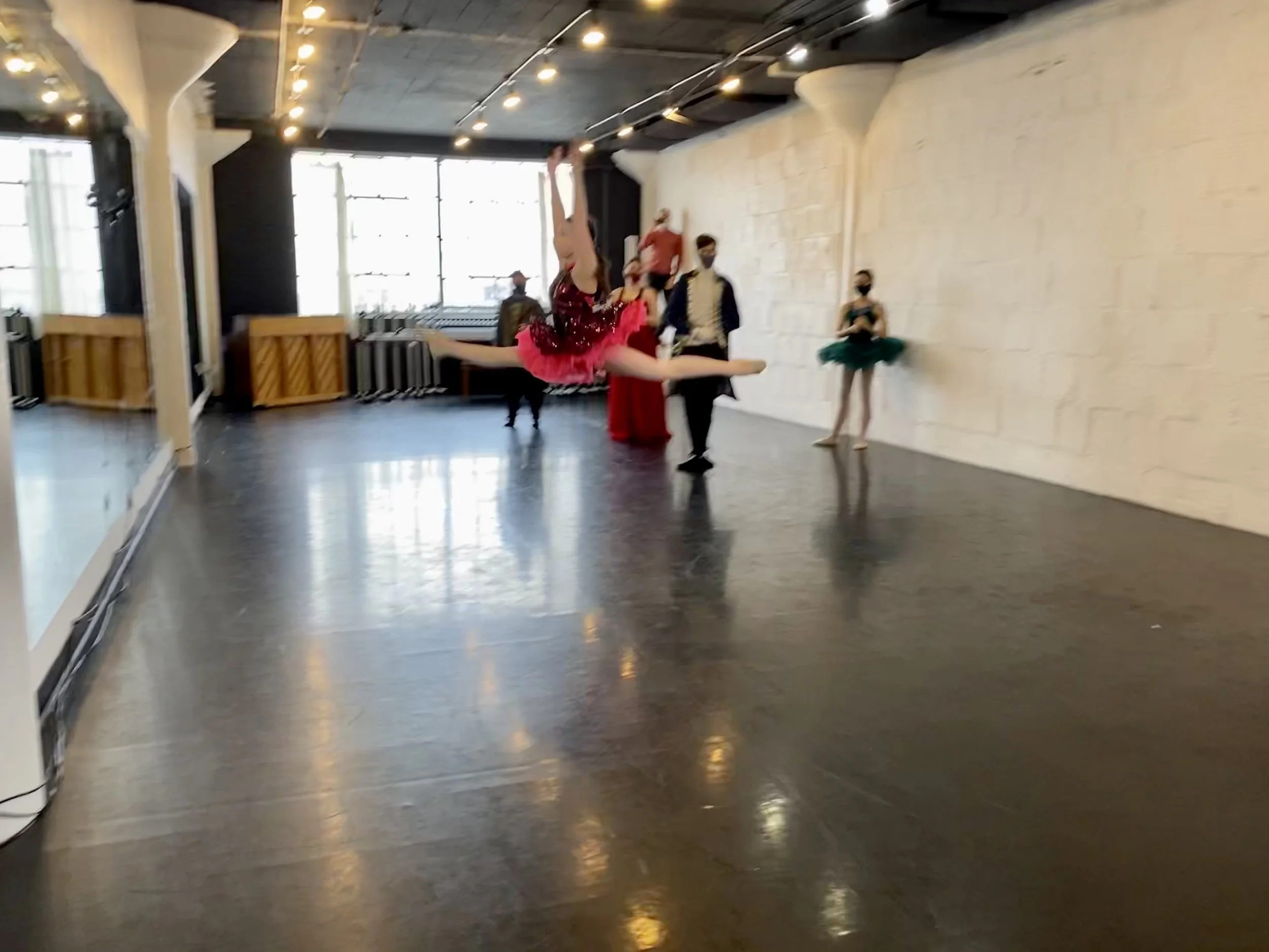 leap pink tutu window white brick wall black floor Dance dancer studio acting ballet jazz lyrical contemporary theater musical camp singing voice glee club Amber Keeley director Mpls classes twin cities workshops Spring Dance Theatre Academy NE Minne