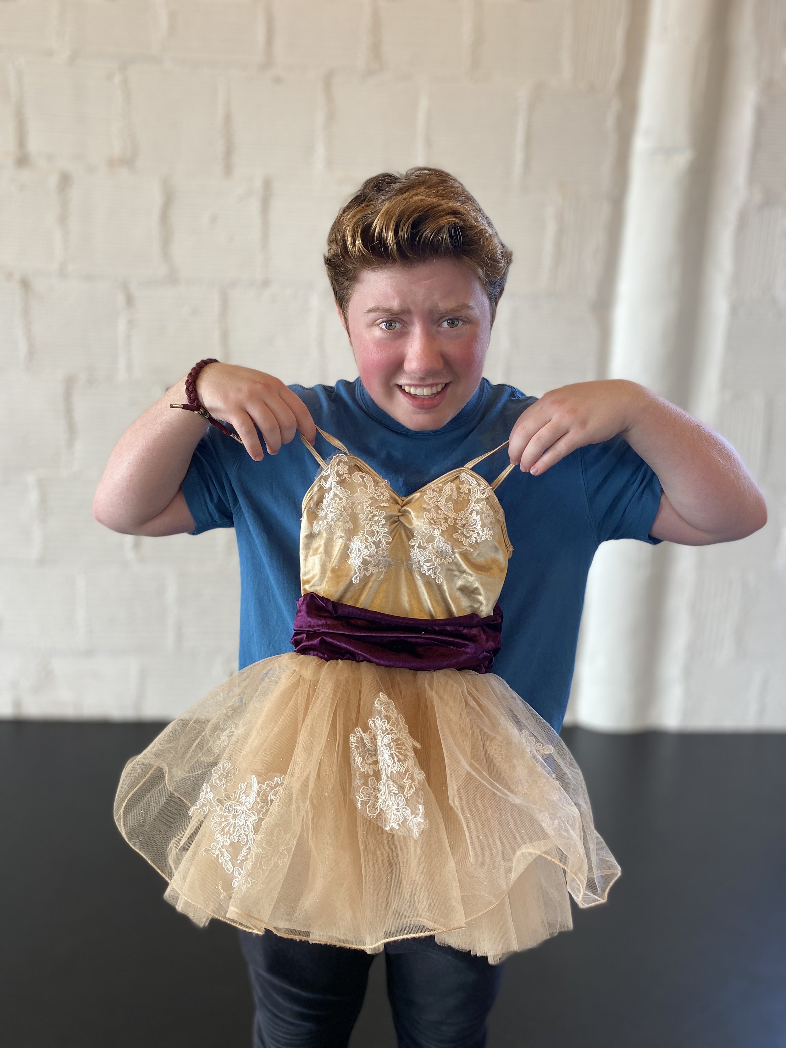 small dance costume tutu confused boy blue shirt gold and purple dress Dance acting ballet jazz lyrical contemporary theater musical camp singing voice glee club Amber Keeley director Mpls classes twin cities workshops Spring Dance Theatre Academy NE