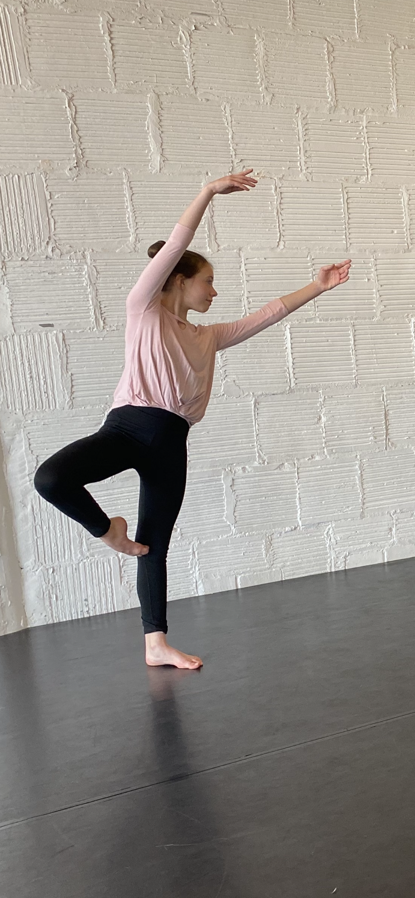 moving passé passe pink top white brick wall Dance acting ballet jazz lyrical contemporary theater musical camp singing voice glee club Amber Keeley director Mpls classes twin cities workshops Spring Dance Theatre Academy NE Minneapolis MN St St. Sai