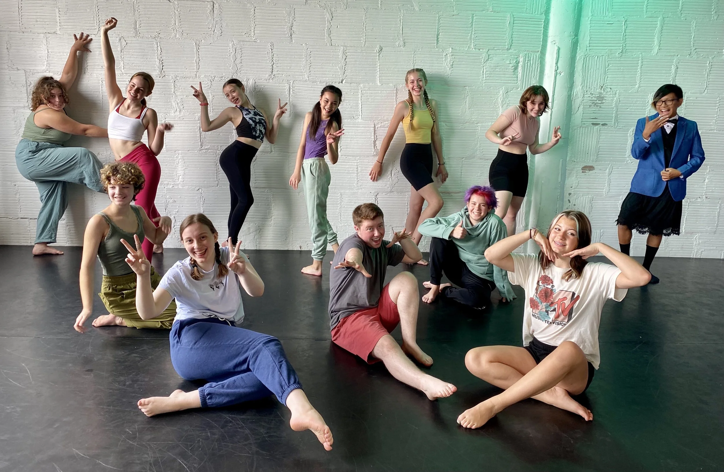 blue pants shirt shorts yellow purple black white pink green black floor white brick wall  Dance dancer studio acting ballet jazz lyrical contemporary theater musical camp singing voice glee club Amber Keeley director Mpls classes twin cities worksho