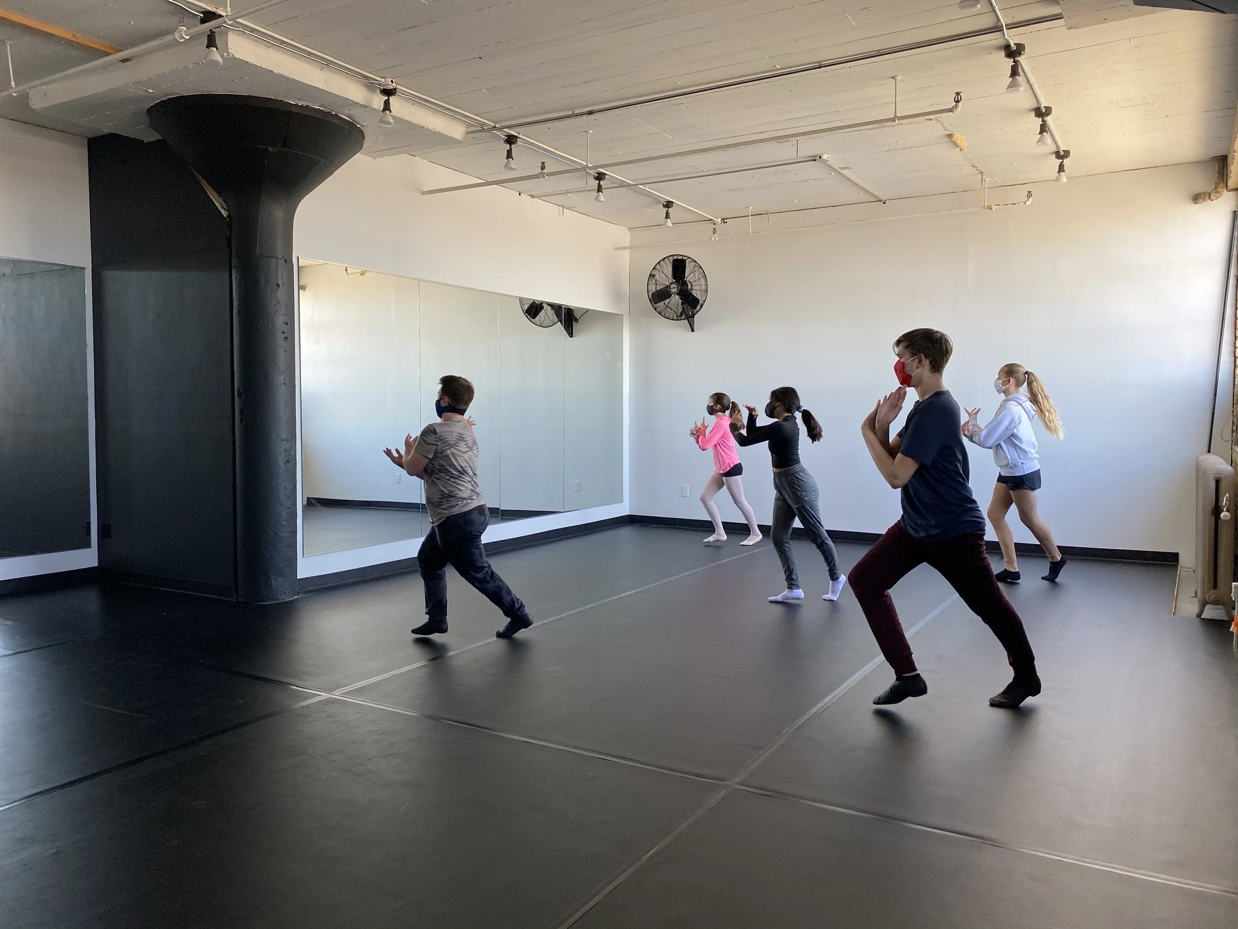 moving 3 girls 2 boys mirrors black floor Dance dancer studio acting ballet jazz lyrical contemporary theater musical camp singing voice glee club Amber Keeley director Mpls classes twin cities workshops Spring Dance Theatre Academy NE Minneapolis MN
